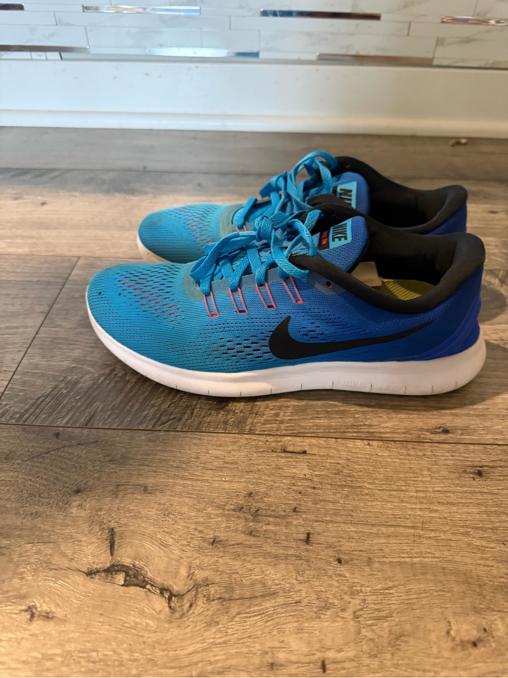Nike Blue Athletic Sneakers with Black Swoosh